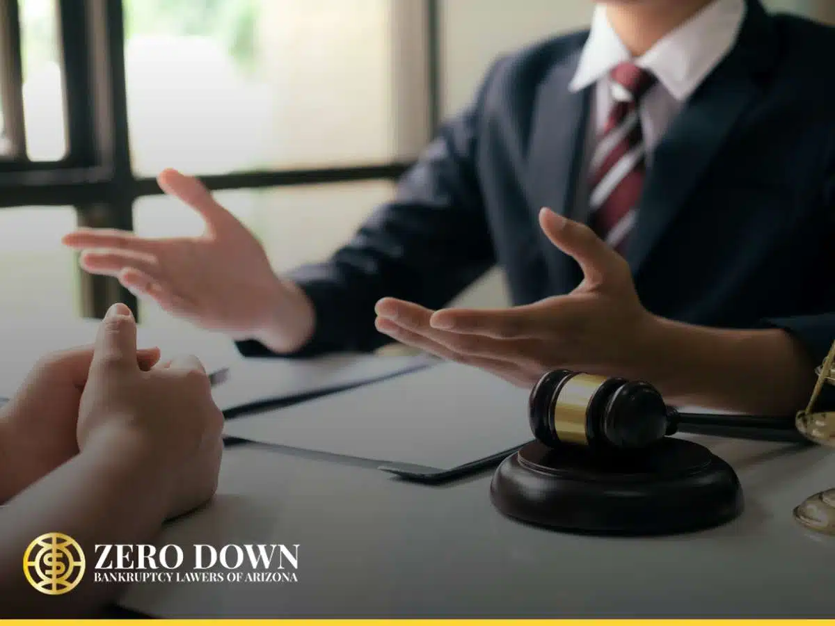 A lawyer discussing Foreclosure Dispute options with a client in an office, with a gavel on the desk