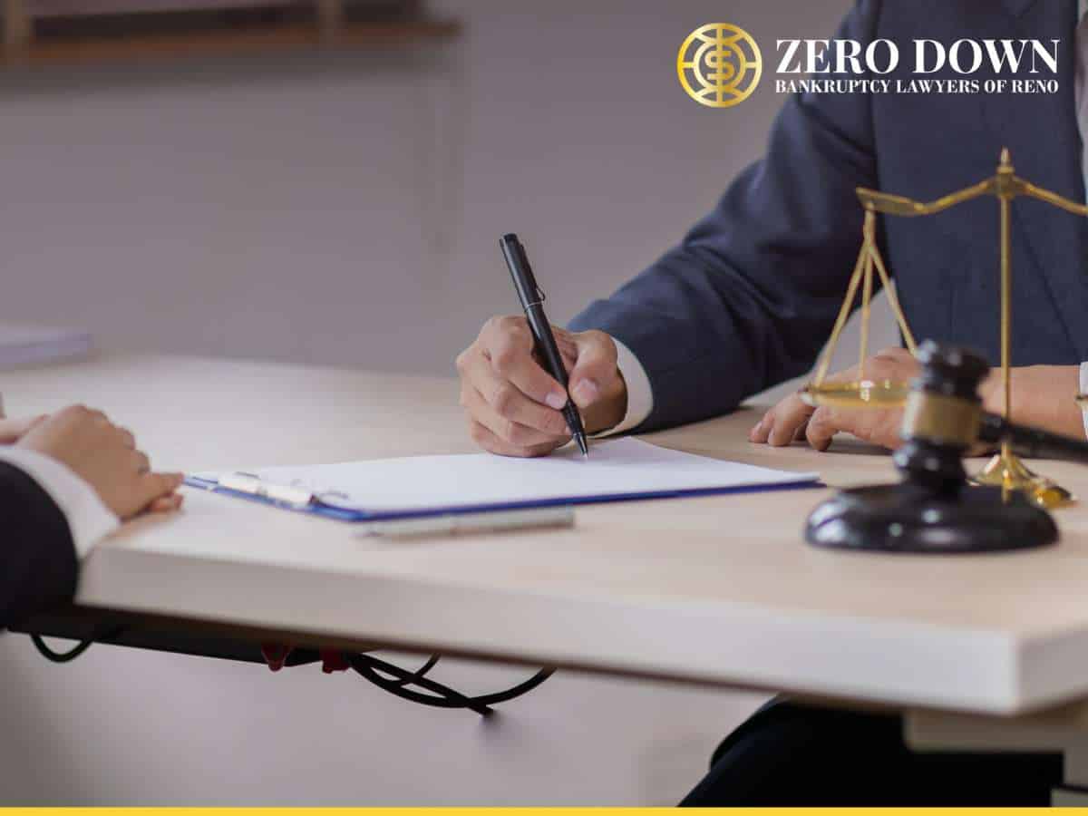 A lawyer signing documents at a desk with a gavel, representing legal services for cases like the Arizona Local Pizza Chain Files For Bankruptcy.
